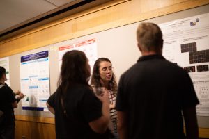 Charline presenting her poster